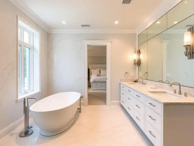 Luxury master bathroom with freestanding tub and double vanity in Coos Bay OR – Premier Coastal Construction