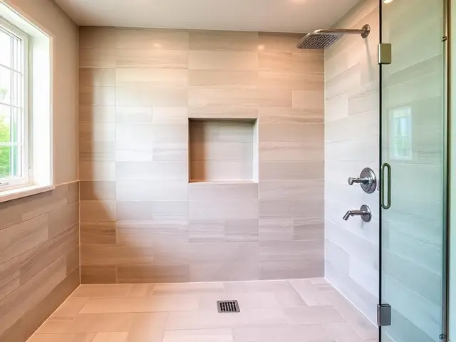 Spa-style shower remodel with rain showerhead and built-in niche in North Bend OR – Premier Coastal Construction