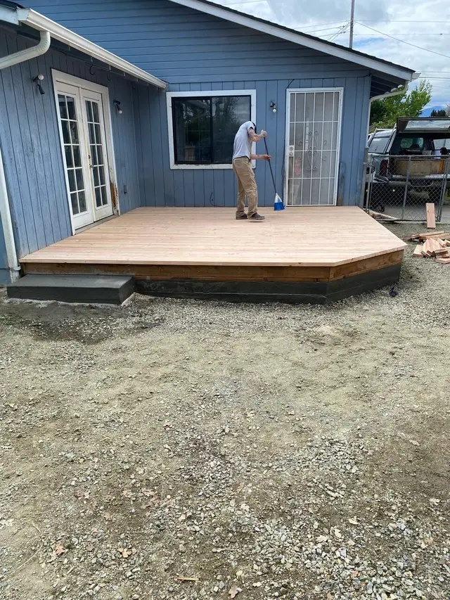 Cedar deck platform build with French door access in Coos Bay OR – Premier Coastal Construction