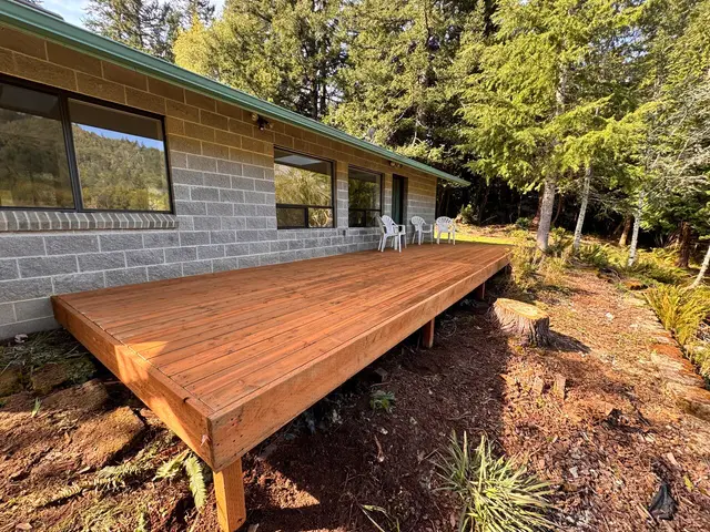 Custom cedar deck platform with forest views in North Bend OR – Premier Coastal Construction