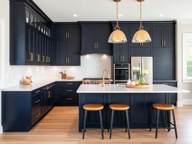 Navy blue cabinet kitchen renovation with gold hardware and marble backsplash in Coos Bay OR – Premier Coastal Construction