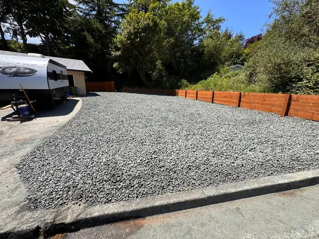 Gravel pad installation with cedar retaining wall in North Bend OR – Premier Coastal Construction